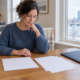 A person organizing records for a pre-existing condition personal injury claim in Grand Rapids
